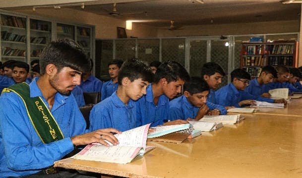 Students studying together in the library